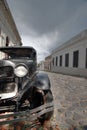 Vintage car on a cobblestone street