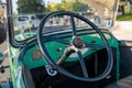Vintage car detail, antique car steering wheel Royalty Free Stock Photo