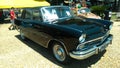 vintage car exhibition in brazil, antique black sedan car