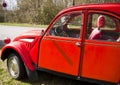 Vintage car, French Citroen 2CV red,lateral view
