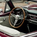 Vintage Car Interior Wooden and Steel Steering Wheel in Cabriolet Royalty Free Stock Photo