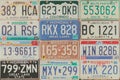 Vintage car license plates on a wall Royalty Free Stock Photo