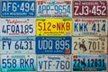 Vintage car license plates on a wall Royalty Free Stock Photo