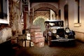 Vintage car with many suitcases, ready for travel