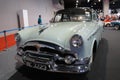 Vintage car the Packard Clipper Deluxe displayed in the huge showroom.