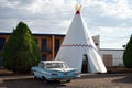 Vintage car parked in front of the Wigwam Motel, Route 66 Royalty Free Stock Photo