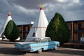 Vintage car parked in front of the Wigwam Motel, Route 66 Royalty Free Stock Photo