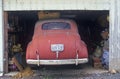 Vintage car parked in garage Royalty Free Stock Photo