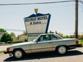 Vintage car and sign at the Beltway Motel, in Baltimore, Maryland