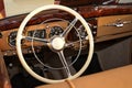 Steering wheel of vintage car. Royalty Free Stock Photo