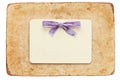 Vintage card with lilac bow isolated on white Royalty Free Stock Photo