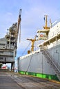 Vintage cargo vessel at dock