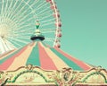 Vintage carousel and ferris wheel Royalty Free Stock Photo