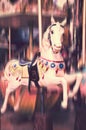 Vintage carousel horse. Antique style carved wood on an old amusement merry go round motion blur Royalty Free Stock Photo