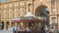 Vintage carousel timelapse and tourists in Piazza della Repubblica in Florence, Italy.