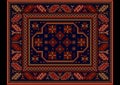 Vintage carpet with ethnic ornament in burgundy and dark blue colors