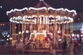 Vintage carrousel. Blurred merry-go-round. blurred holiday carousel background Royalty Free Stock Photo