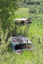 Vintage cars abandoned in nature