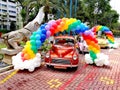 Vintage cars and colourful balloons