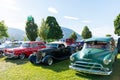 Vintage cars on display by Okanagan Lake during the Peach City Beach Cruise