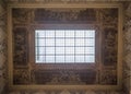 Vintage carved ceiling with window