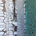 Peeling paint on a wooden window surface. Abstract vintage background. Royalty Free Stock Photo