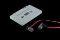 Vintage cassette tape and red earphone Royalty Free Stock Photo