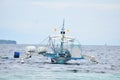 Vintage Catamaran Boat Floating In Ocean