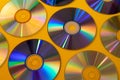 Vintage CD or DVD disk background, old circle discs used for data storage, share movies and music Royalty Free Stock Photo