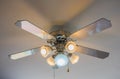 Vintage ceiling fan and lamp on white background Royalty Free Stock Photo