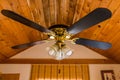 Vintage ceiling wooden fan with lamp Royalty Free Stock Photo