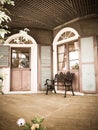 Vintage chair and bulding in glover garden