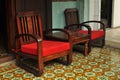 Vintage chair and mosaic tiles at one of the heritage shops, hostel, cafe and bar in Penang Malaysia