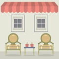 Vintage Chairs Set With Coffee Under Awning And Windows