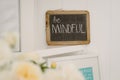 Vintage chalkboard with the motto Be Mindful