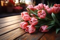 Vintage charm festive tulip bouquet gracing a wooden table Royalty Free Stock Photo