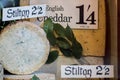 Vintage cheese shop mock-up. Old English stilton and cheddar dis Royalty Free Stock Photo