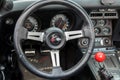 Vintage Chevrolet Corvette interior - steering wheel with logo and dashboard Royalty Free Stock Photo