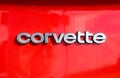 Vintage Chevrolet Corvette logo on red background Royalty Free Stock Photo