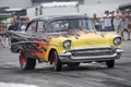 Vintage chevrolet drag car on the track