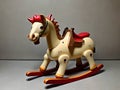 Vintage children\'s wooden rocking horse with colored paints.