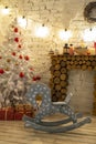 A Vintage Children`s Wooden-swing Wooden Horse In The Festive Room.