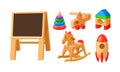 Vintage children wooden toys set. Baby entertainment wood playthings, blackboard, helicopter, rocket, whirligig, house, whirligig