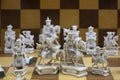 Vintage Chinese marble chess pieces on a chessboard. Royalty Free Stock Photo