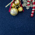 Vintage Christmas Background, Set Of Gold Ornament Balls, Snowflake And Candy Cane On Glitter Blue Background