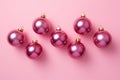 Vintage christmas baubles and decorations. Xmas balls. Festive purple pattern on pink background.