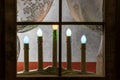 Vintage Christmas candles in window Royalty Free Stock Photo