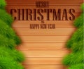 Vintage Christmas fir tree on wooden background Royalty Free Stock Photo