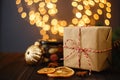 Vintage Christmas gift box on dark background with bokeh lights Royalty Free Stock Photo