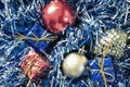 Vintage Christmas ornament photo. Christmas tree balls and wrapped gift boxes.